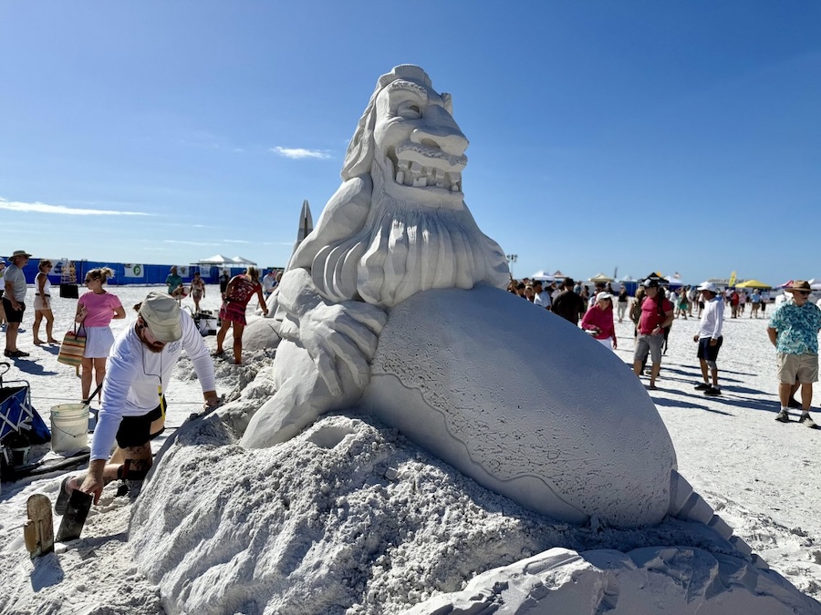 sandcastle artist making sand art in siesta ket