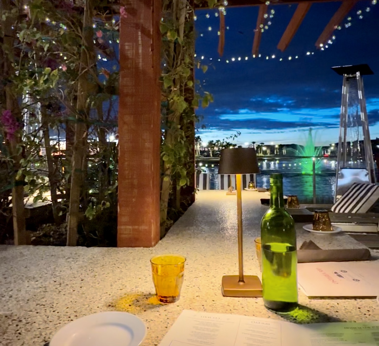 sitting waterside at osteria restaurant