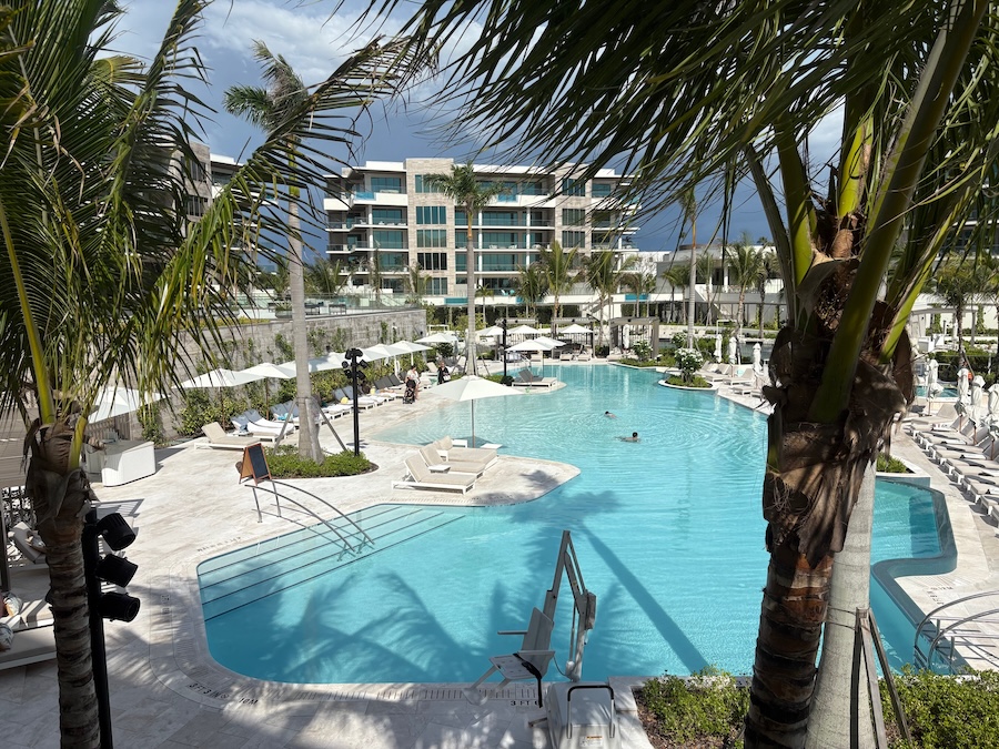 people swimming at the pool at the st regis longboat key