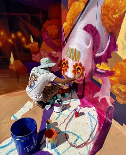 artist painting at the sarasota chalk festival