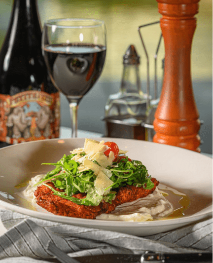 the ringling grillroom dish and bottle of wine